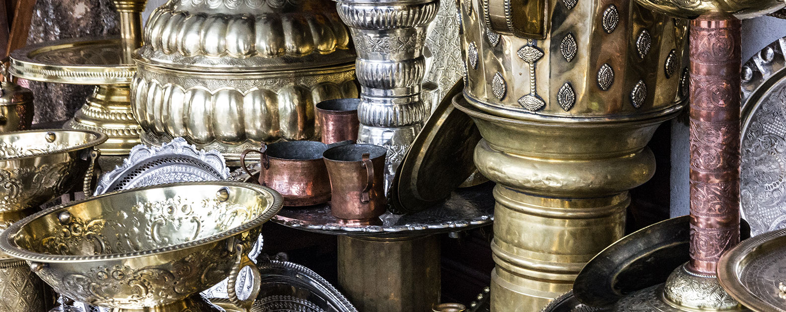Metal utensil stamping on Moroccan market